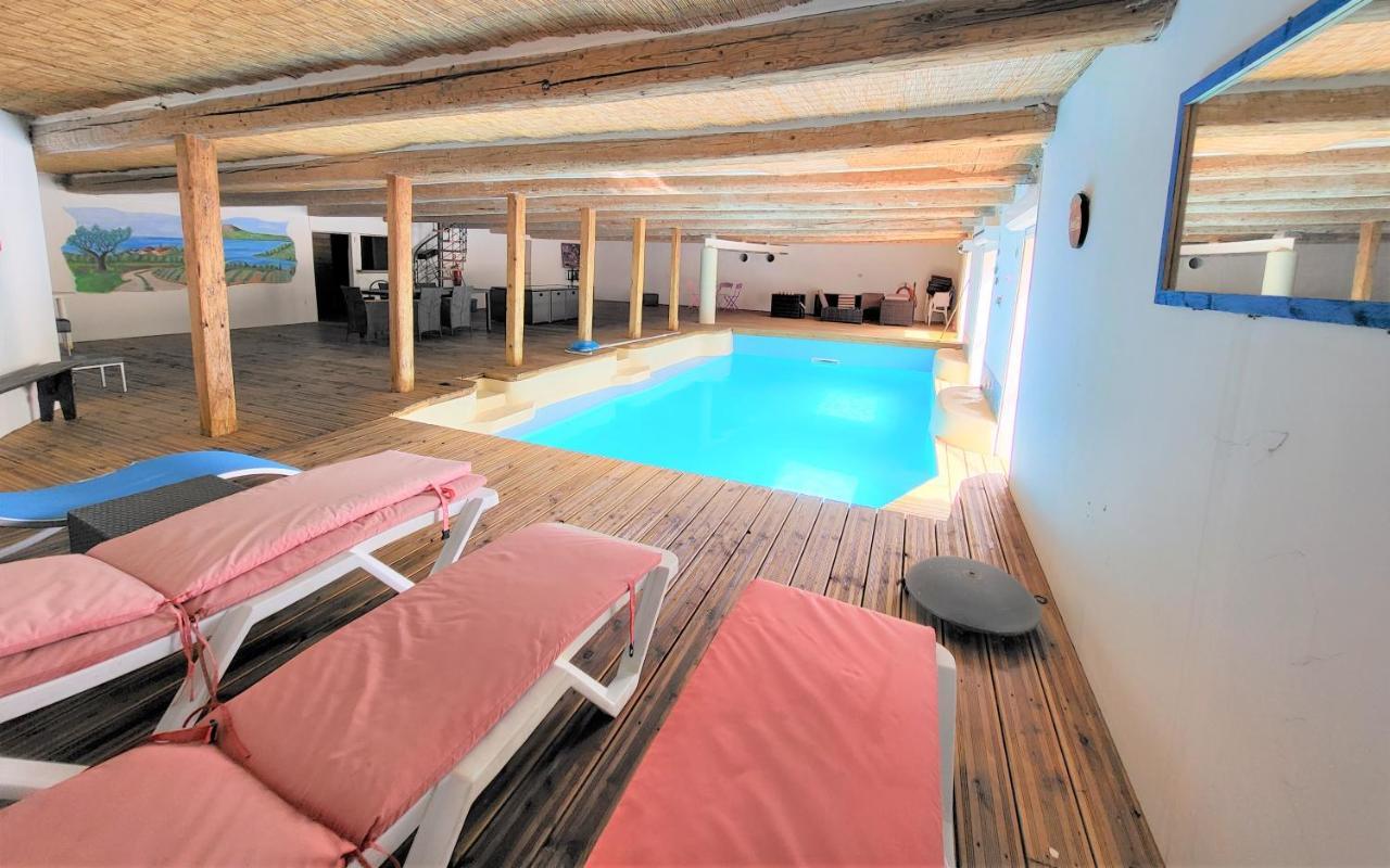 Maison 3 Chambres Avec Piscine Couverte Lespignan Bagian luar foto